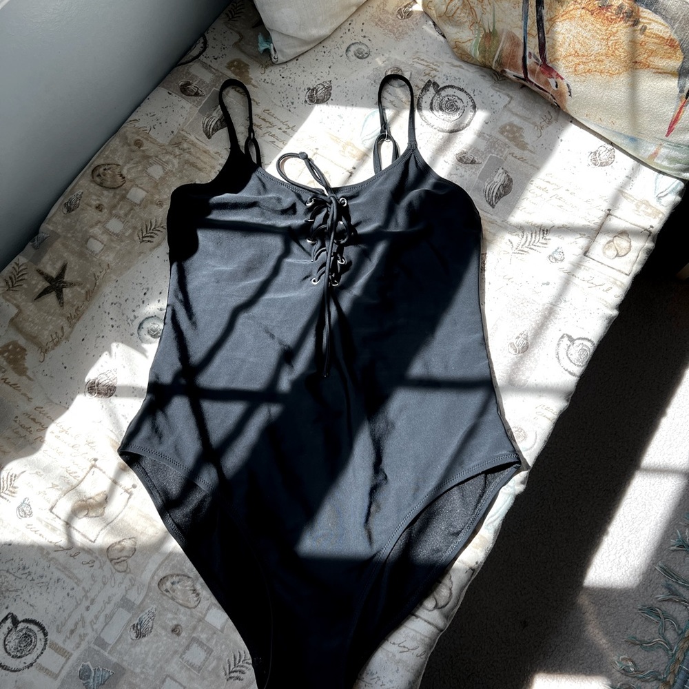 Large one piece swimsuit, black tie up at the bodice no cups